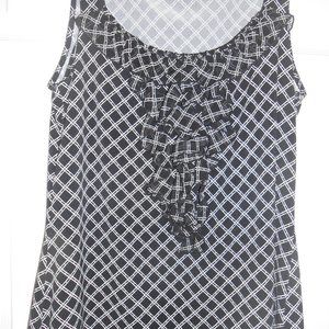 White House Black Market sleeveless top size Large in black and white.